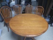 Oak dining room table with 4 matching chairs