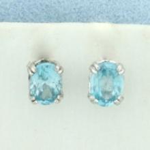 Blue Topaz Stud Earrings In Sterling Silver