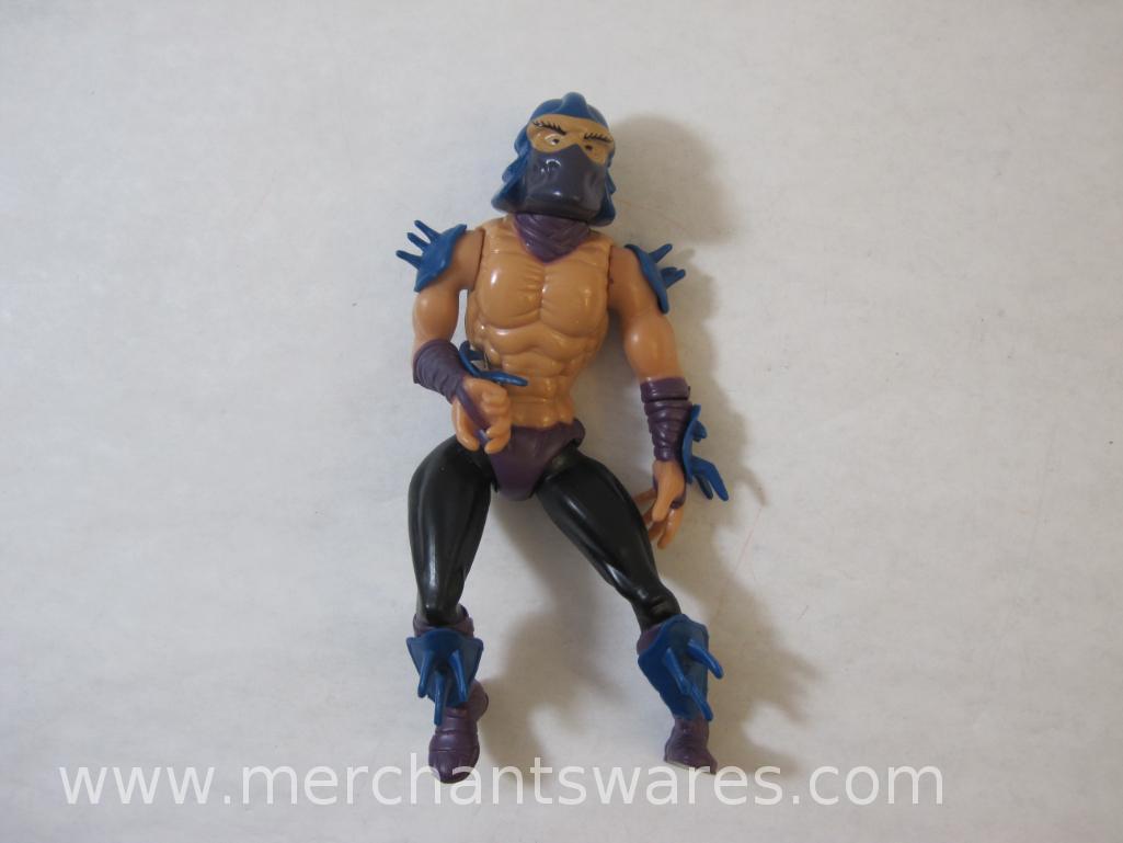 Five Teenage Mutant Ninja Turtles Action Figures including Casey Jones, April O'Neil and Shredder