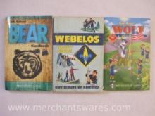 Three Scout Books including Webelos Scout Book (1967), Cub Scout Wolf Handbook (2011) and Cub Scout
