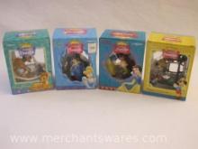 Four Enesco Disney Classics Holiday Ornaments in Original Boxes including Bambi, Pinocchio, Snow