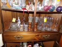 Contents of Lower Shelf of Corner Cabinet, Champagne Flutes, Candles, Sugar