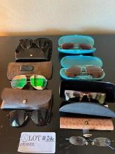 Various Sunglasses And Reading Glasses
