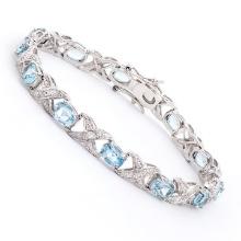 Plated Rhodium 11.26ctw Blue Topaz and Diamond Bracelet