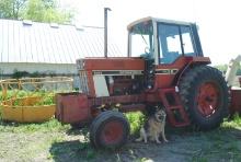 International 1086 Tractor, diesel, wide front, rock box, cab, CD player, new style step, A/C & heat