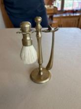 Vintage copper shaving brass and razor holder.