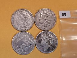 Four mixed Morgan Silver Dollars