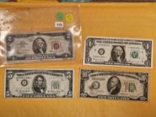 Four mixed pieces of US currency