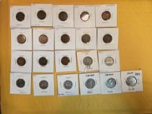 Twenty one carded Canadian coins
