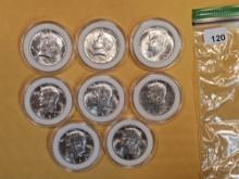 Eight Brilliant Uncirculated silver Kennedy Half Dollars