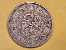 1898 Japan silver 50 sen in Very Fine plus