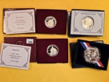 Four Silver Proof and GEM BU Commemorative Coins