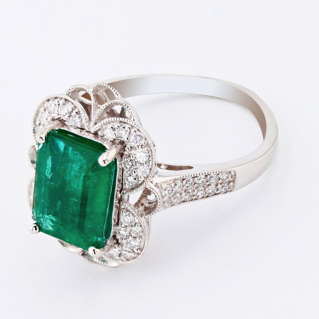3.39 ctw Emerald and 0.44 ctw Diamond Platinum Ring