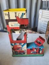 Vintage Tin Wolverine Automatic Sand Loader Toy