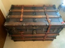 Antique Steamer trunk 35 inches wide x 21 inches deep x 24 inches tall. Shoes and other items inside