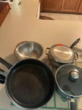 Pans with a couple of pots.