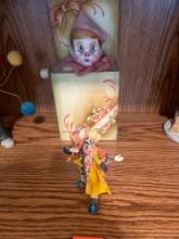 Home decor, Clown as Jack in the box clown, caring something over his shoulder