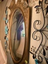 Mirrors and metal flower decor