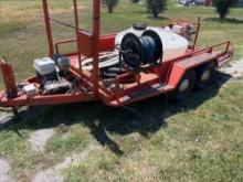 150 gallon tank on trailer with motor and pump