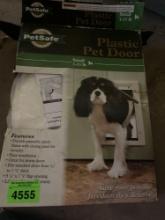 Plastic pet door.