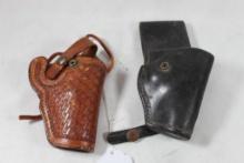 Two leather right handed belt holsters for snubby revolvers. Used.