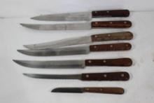 Seven Case kitchen knives. See photo.