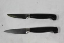 Two Henckels paring knives.