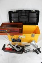 Yellow and black plastic tool box with miscellaneous tool, vice, Lansky knife sharpener, etc. Used.