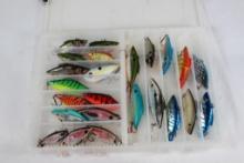 One plastic box with fishing lures. Used.