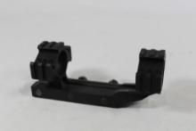 One AR-15 rail mount base with cantilever rings. Used in very good condition.