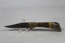 Frost Cutlery Mako with stag scales. 3 inch blade. Lock back.