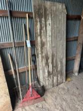 Barn door and long handled tools