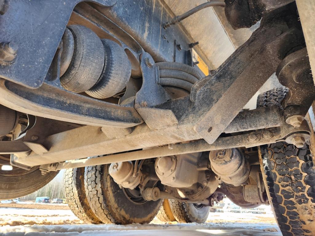 2014 Caterpillar Quad Axle Dump Truck
