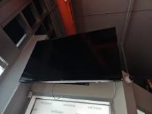 LG flat 65" screen working TV with movable bracket