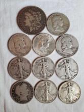 1 Morgan Dollar and 10 Silver Half Dollars (1 Barber, 5 Walking Liberty, and 4 Franklin)