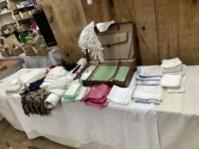 Lots of Linens & Leather Suitcase