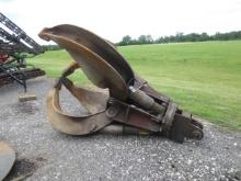 Young Excavator Grapple