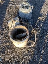 Roll of Wire, Battery Charger, Bucket with Miscellaneous