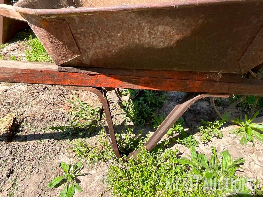 Vintage steel wheeled wheel barrow