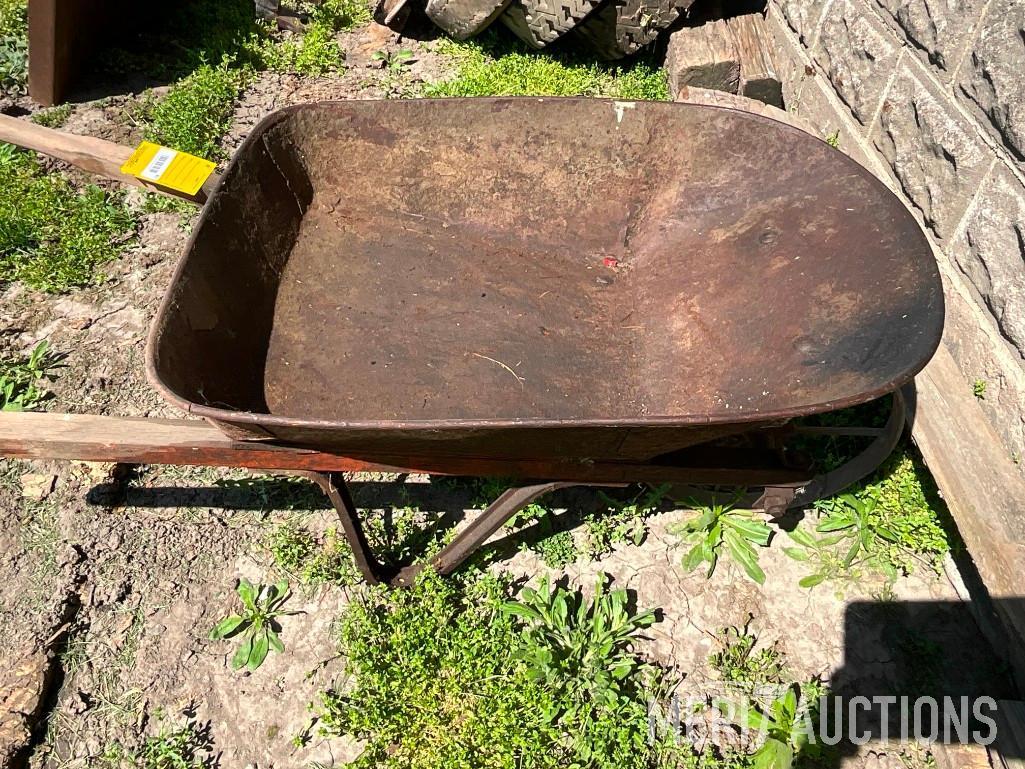 Vintage steel wheeled wheel barrow