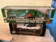 Pioneer semi and trailer, and Mercedes-Benz toy car