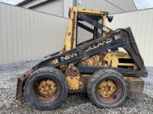 New Holland L555 Deluxe Wheel Skid Loader