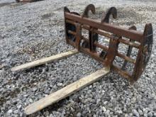 Pallet forks off Cat 938H Wheel Loader