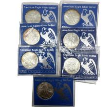 Lot of Seven 1996 and 1997 American Silver Eagle 1 Ounce Silver Coins