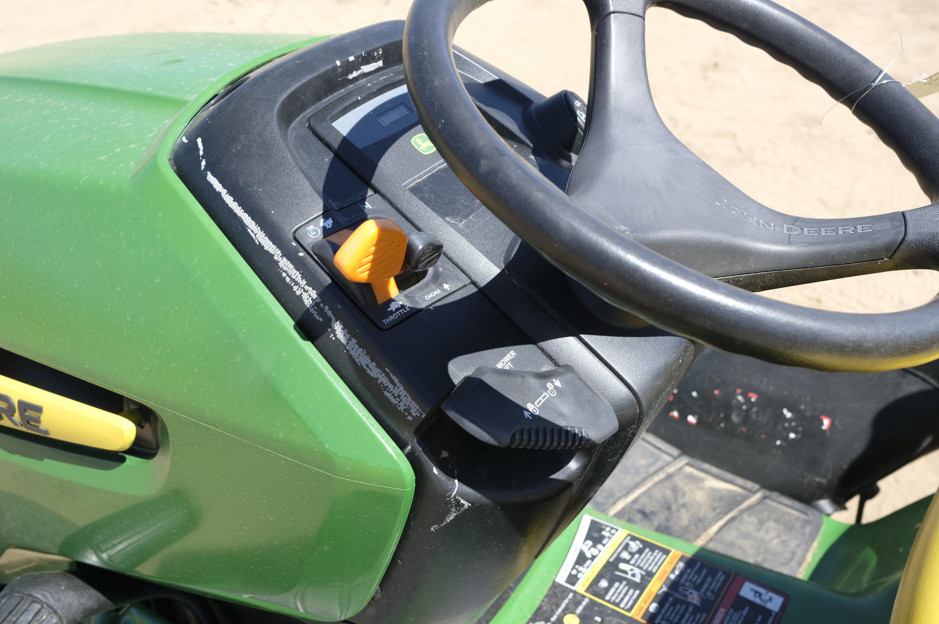 John Deere X300 riding lawn mower