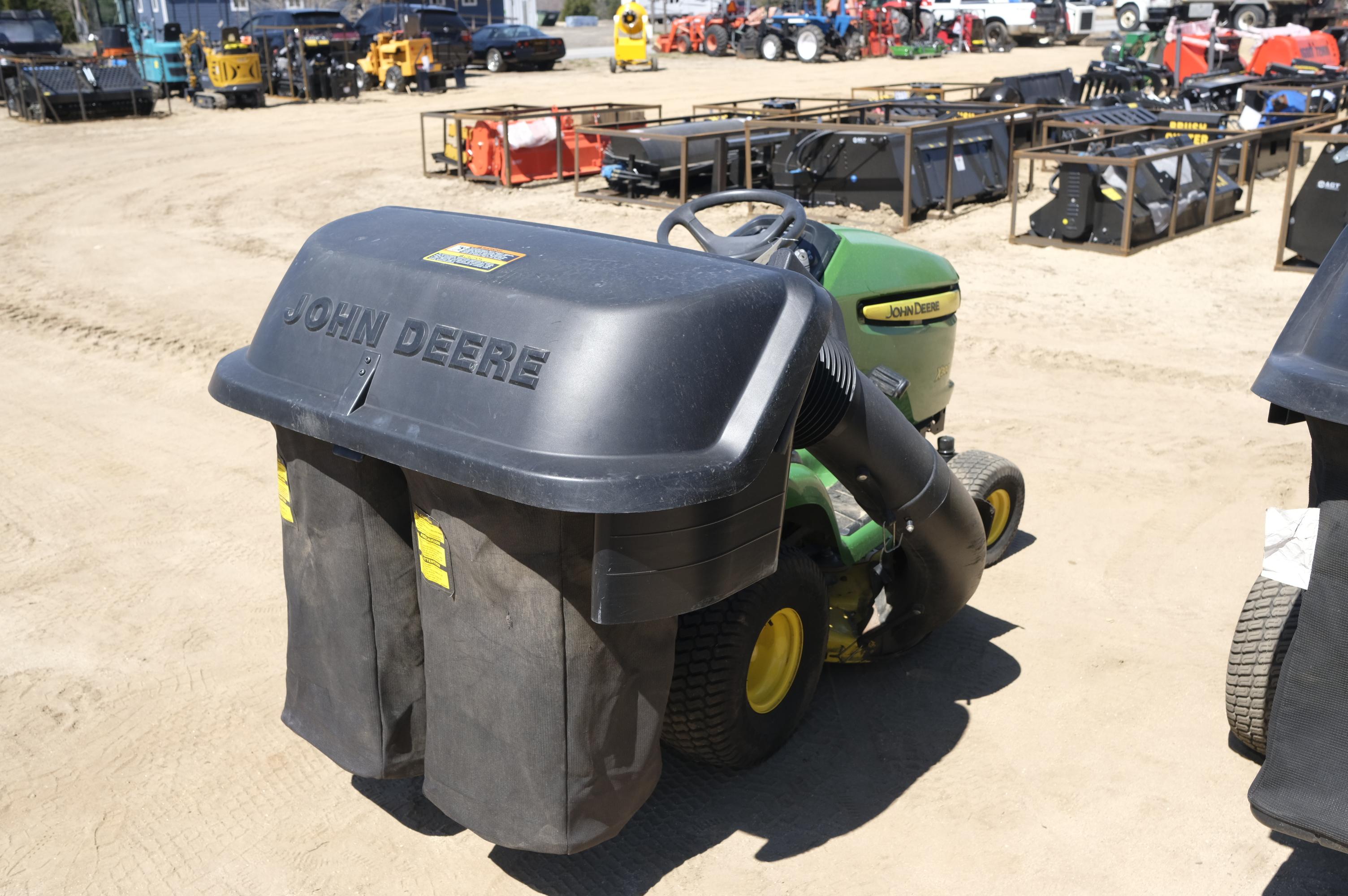 John Deere X300 riding lawn mower