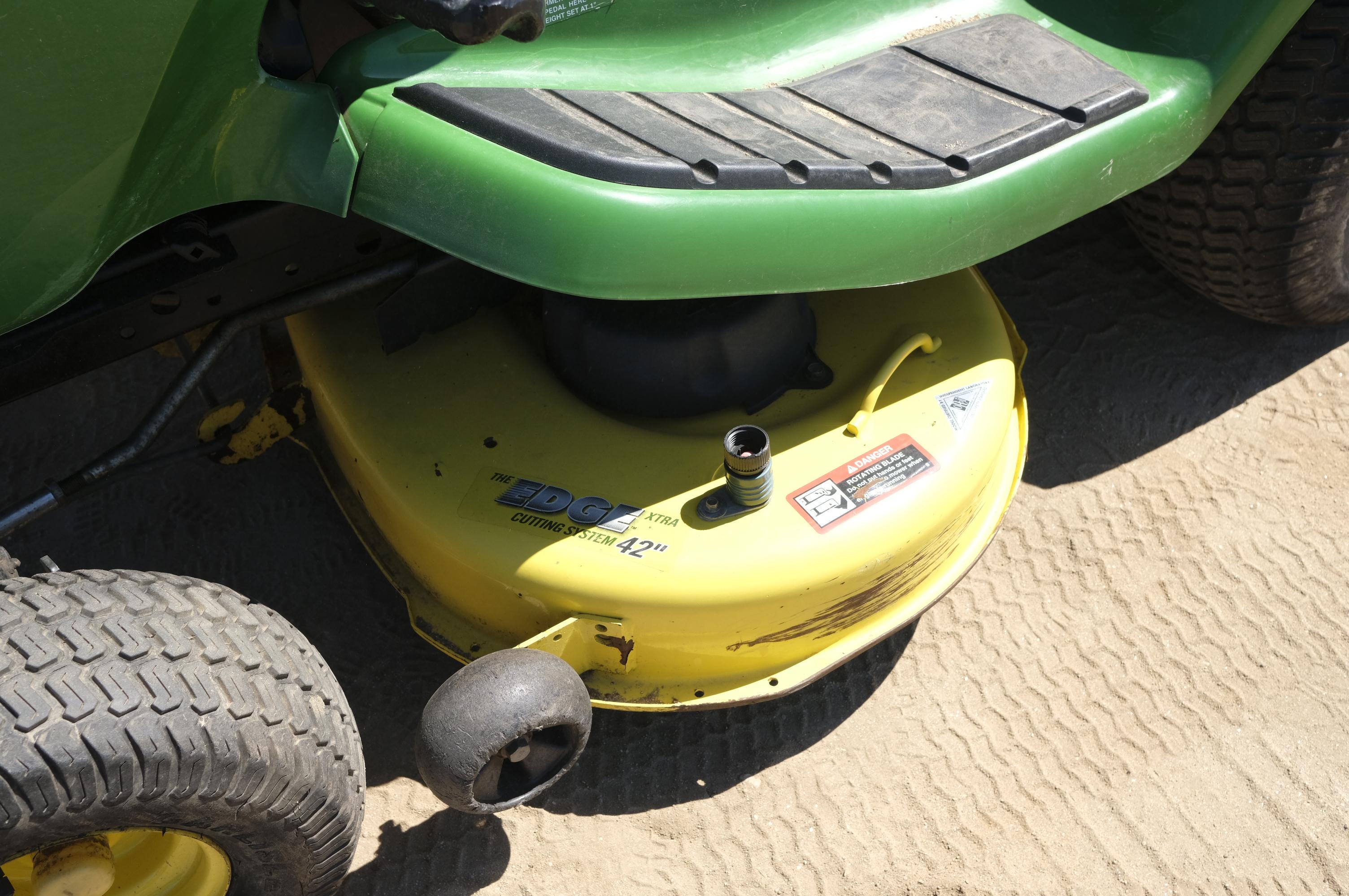 John Deere X300 riding lawn mower