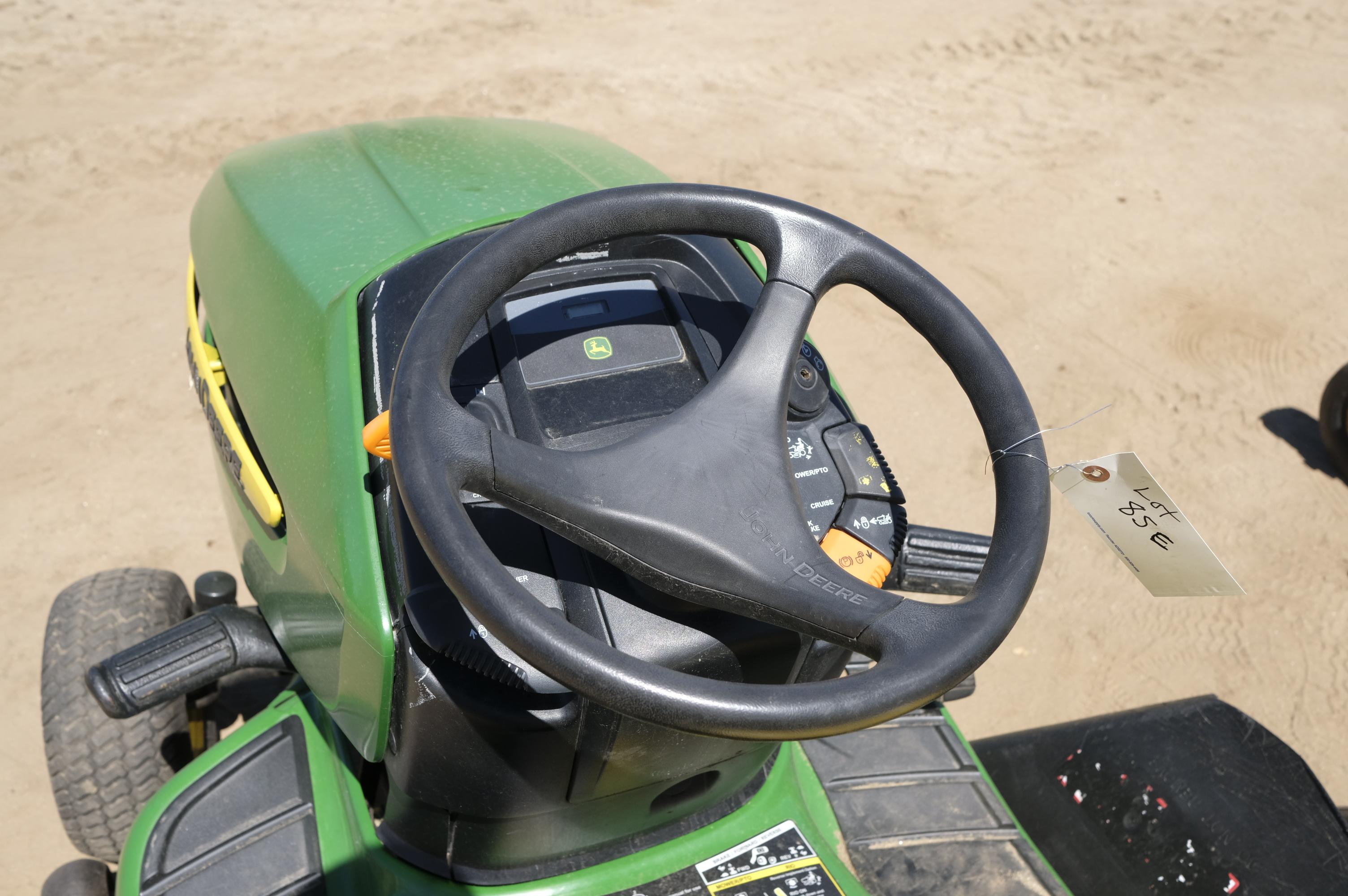 John Deere X300 riding lawn mower