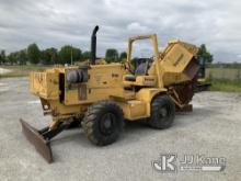 (Hawk Point, MO) 2000 Vermeer V120 Rubber Tired Earthsaw Runs, moves, operates. (Minor paint and rus