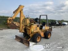 (Hawk Point, MO) 1999 Case 560 Rubber Tired Trencher Runs, Moves, Operates. (Outrigger cylinders lea